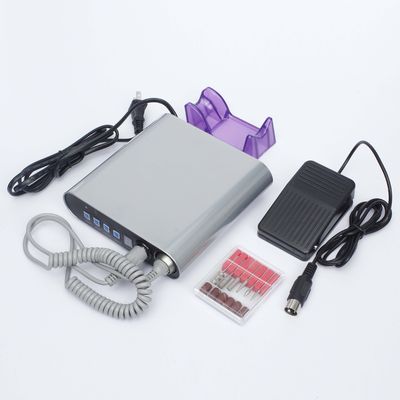 El taladro eléctrico más fino de la manicura, máquina pulidora del clavo con el pedal del pie